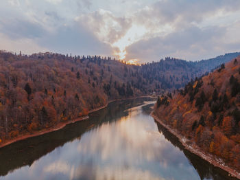 Scenic view of lake against sky during autumn