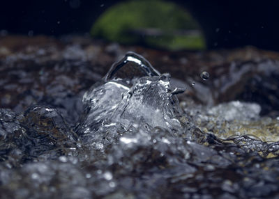 Close-up of water drop on rock