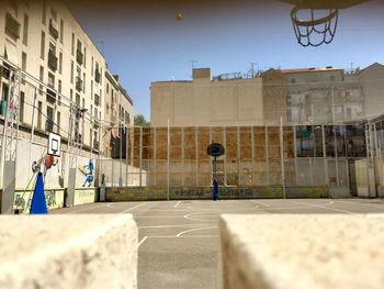 Surface level of street against buildings in city