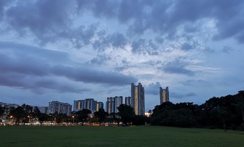 Modern buildings in city against sky