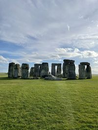 Low angle view of rock formations against sky