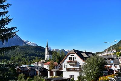 Residential buildings against clear sky