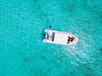 High angle view of boat sailing in sea