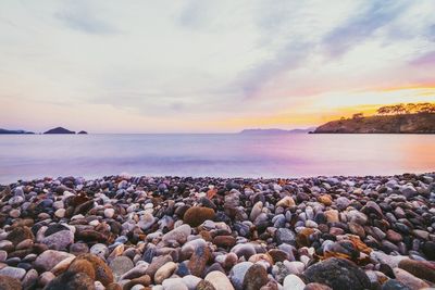 Scenic view of sea against cloudy sky