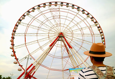 Traveler looking up to the 80 meter high ferris wheel on batumi boulevard, batumi city, georgia