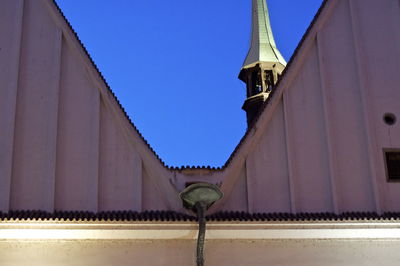 Low angle view of built structure against clear blue sky