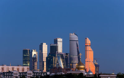 Modern buildings against blue sky