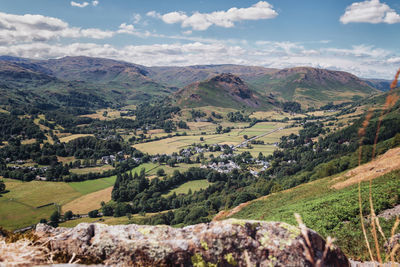 Scenic view of landscape and mountains against sky