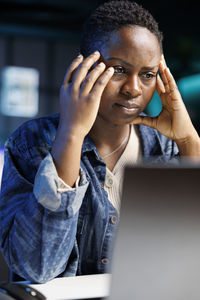 Young woman using laptop