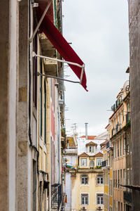 Buildings in city against sky