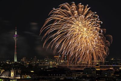 Firework display at night