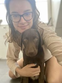 Portrait of woman with dog