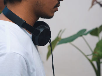 Close-up of young man standing outdoors