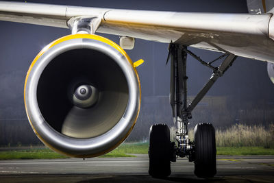 Cropped image of airplane on runway