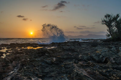 Scenic view of sea against sky during sunset