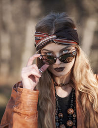 Young woman wearing sunglasses