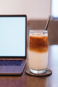 Close-up of coffee cup on table