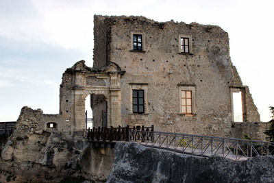 Low angle view of old building against sky