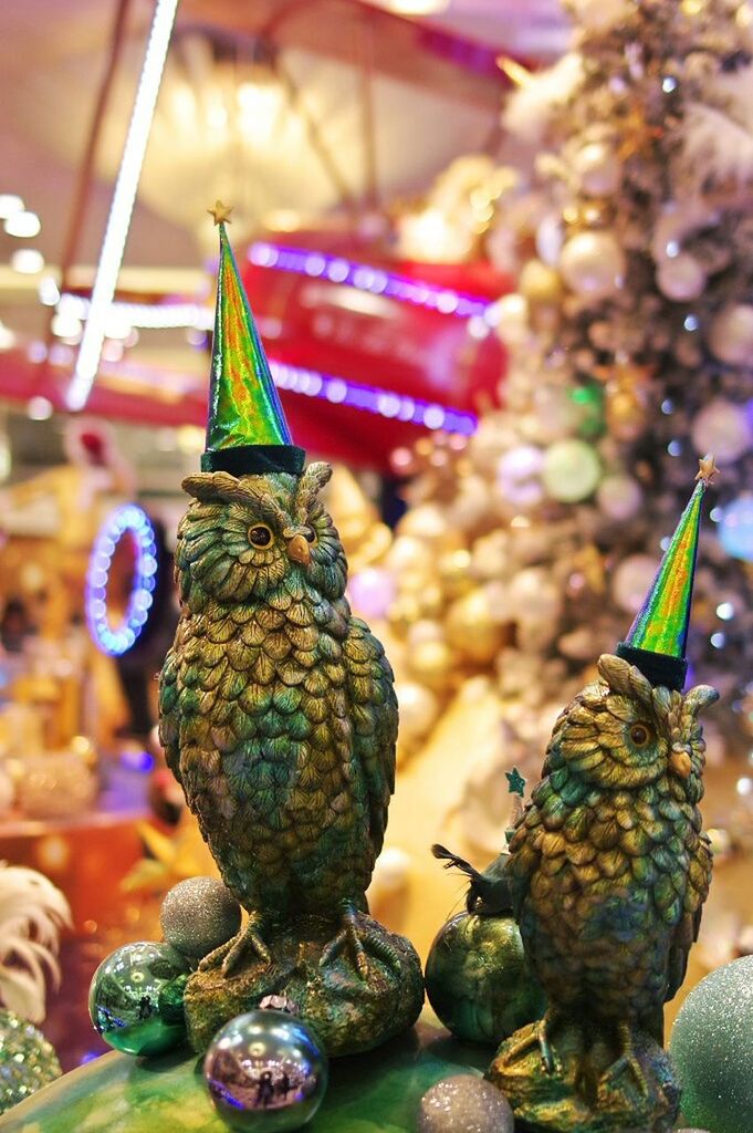 multi colored, focus on foreground, animal themes, for sale, tradition, decoration, close-up, indoors, cultures, retail, hanging, animals in the wild, market, christmas, selective focus, market stall, christmas decoration, abundance, religion