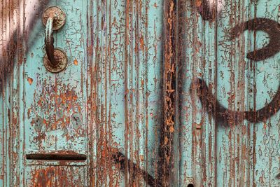 Full frame shot of rusty wooden door