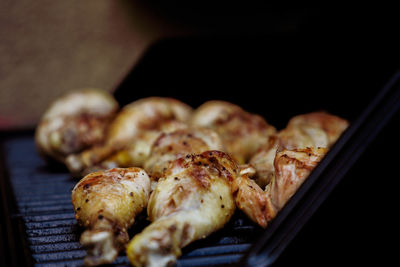 Close-up of meat on barbecue grill