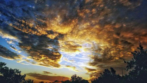 Scenic view of dramatic sky during sunset