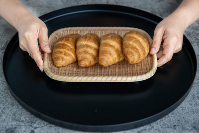 High angle view of person preparing food in plate