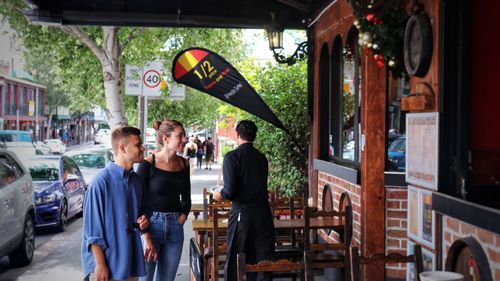 People standing in restaurant