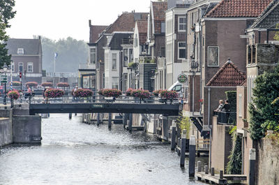 Canalside houses and bridge in dutch town