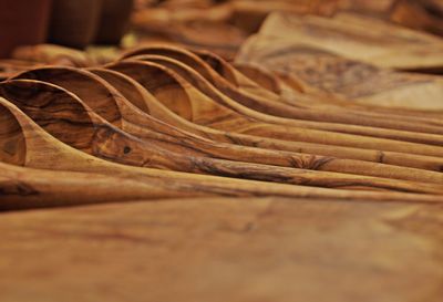 Close-up of wooden spoons on table