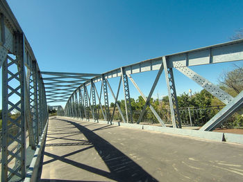 Bridge against clear blue sky