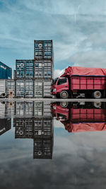 Reflection of truck at dock