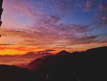 Scenic view of dramatic sky during sunset