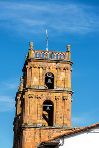 Low angle view of cathedral against blue sky