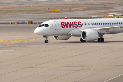 Zurich, switzerland, march 2, 2022 swiss bombardier cs-100 or a220 aircraft is taxiing to the gate