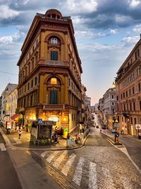 Buildings in city against sky
