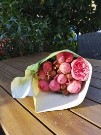 Close-up of pink flowers on table