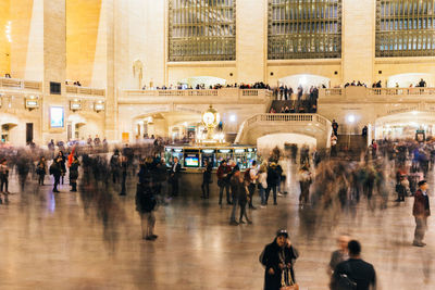 Group of people walking in city