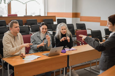 Business colleagues working in office