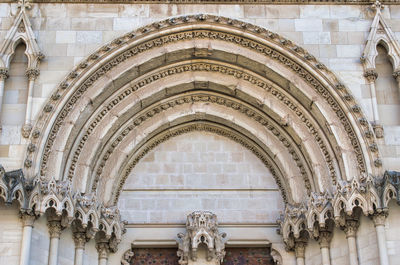 Gothic style portico detail on the main facade of the cathedral santa maria and san julian in cuenca