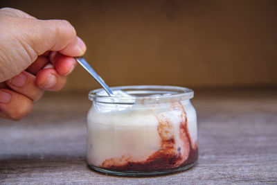 Close-up of drink in glass jar on table