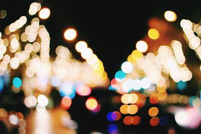 Defocused image of christmas lights at night