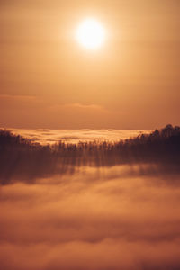 Scenic view of dramatic sky during sunset