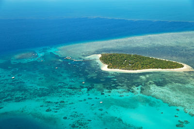 High angle view of island amidst sea