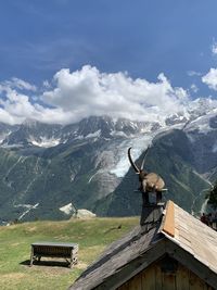 Scenic view of mountain range against sky