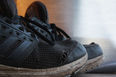 Close-up of shoes on floor