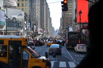 Cars on road in city