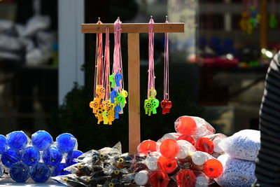 Close-up of multi colored flowers on table