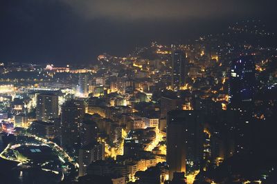 Illuminated cityscape at night