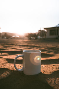 Coffee at sunrise in the desert of oman.